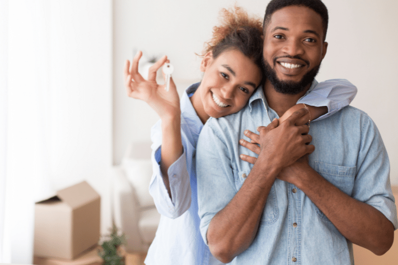 Couple Holding Keys